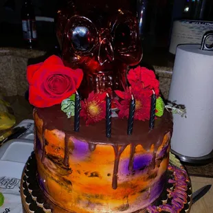 Halloween themed birthday cake with centerpiece; They did an amazing job! Fruit basket flavor was delicious!