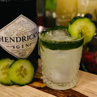 a cucumber and a bottle of hendrick gin