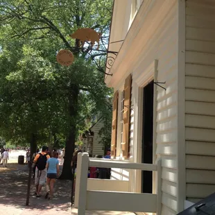 people walking down the sidewalk