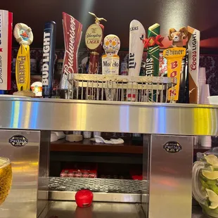 a bar with beer taps
