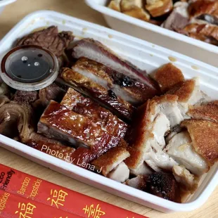85. 3 Combination Meats ($16.50 on Chowbus): beef 牛腩, roast pig 烧肉, BBQ spareribs 排骨