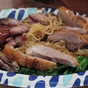Roast duck and pork over noodles