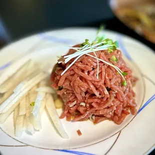 yukhoe (Korean steak tartare). VERY garlicky. A bit too strong for me, but if you love raw garlic, this is the dish to have.