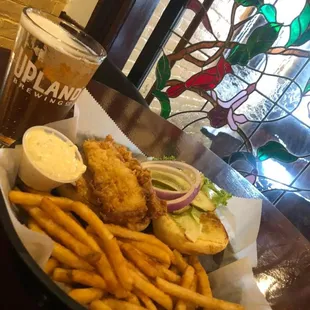Hand breaded and made to order deep fried chicken strips served with fries