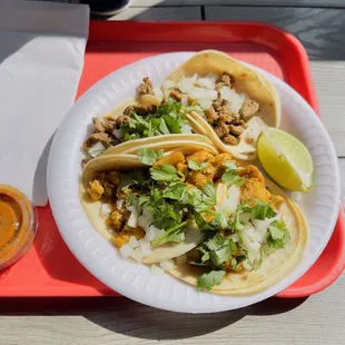 2 chicken tacos 2 asada tacos Hot hot sauce