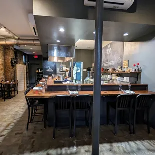 Inside. View of bar and dining room from entrance. This is a small place with a maximum occupancy of 49 people.