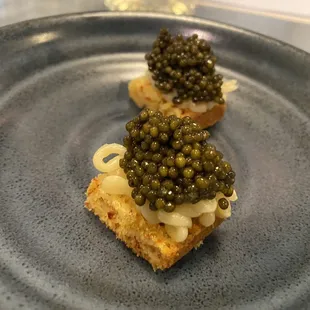 Caviar concoction: two orders pictured, worth it. My husband insists we get this every time we&apos;ve been and we were so glad to see it stayed