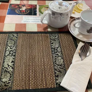 Cute table set up with hot cup of water