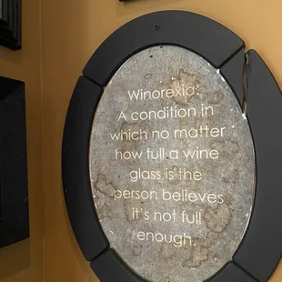 Quirky wine saying on the wall