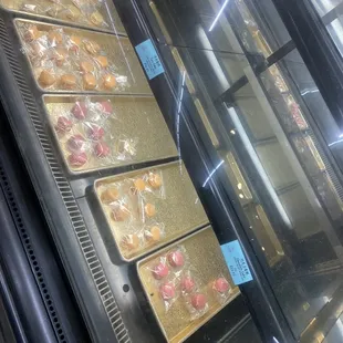 Cakes out, macaroons on bottom.