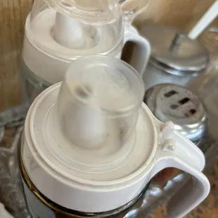 Old and dirty broken soy sauce pot . Please gets a new one!