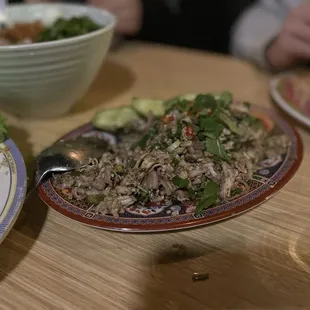 Larb Ga...super tasty, Watch out for those chili peppers on top!