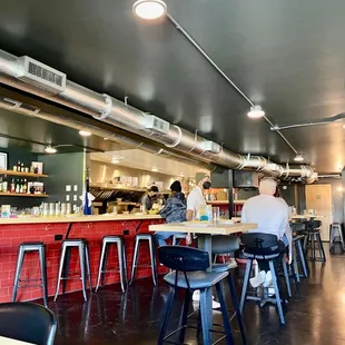 people sitting at the bar