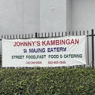 a banner on a fence
