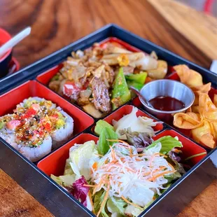 a bento box of food