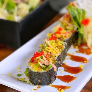 a sushi roll on a plate