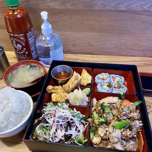 Bento: spicy tuna roll, pad se ew, crab Rangoon, miso soup, salad, &amp; side of rice.