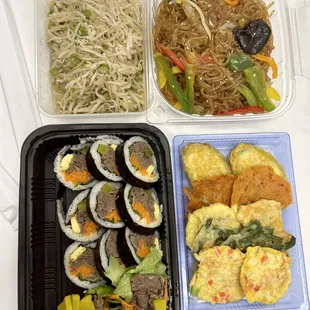 L top to bottom R: bean sprouts, japchae, bulgogi Kimbap, assorted pancakes ($27) - all pretty good, korean authentic food
