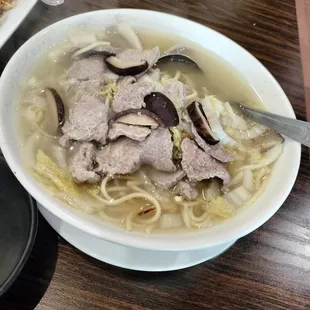 Beef with pickled cabbage noodle soup. Flavorless beef.