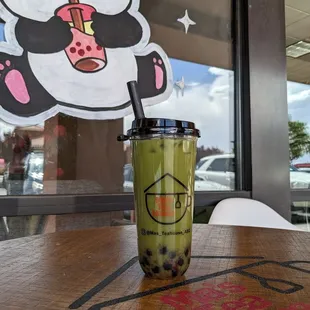 Strawberry  matcha  bubble tea  with oat milk.