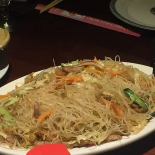 Stir fried rice vermicelli with tender pork strips, not in the menu. Just mention this.