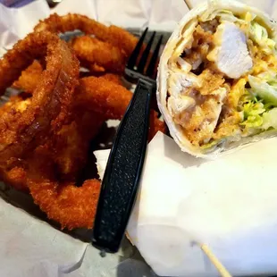 Trying to be healthy and got the chicken wrap. Delicious. But I failed and got the onion rings too. :( but they were good too. *cries*