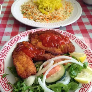 Fish of the day lunch comes with a side salad and basmati rice.