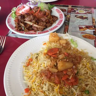 The lamb dish along with rice. Large portions and super delicious!