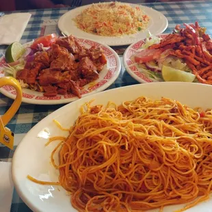 Goat w rice &amp; chicken shawarma w spaghetti, winning!