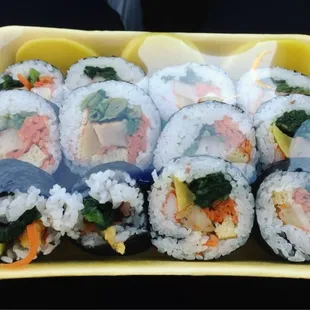 a tray of sushi rolls