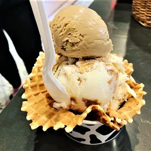 a waffle cone with a scoop of ice cream