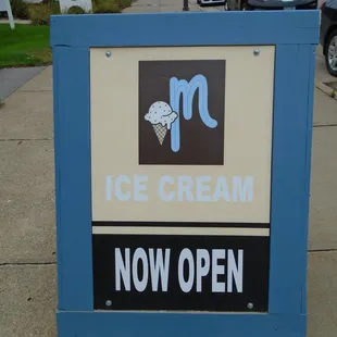 Sandwich sign on the sidewalk - OPEN!