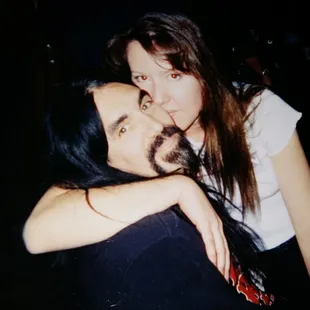 a man and a woman hugging