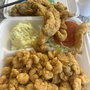Oysters up top, catfish in the middle, shrimp and toast on the bottom