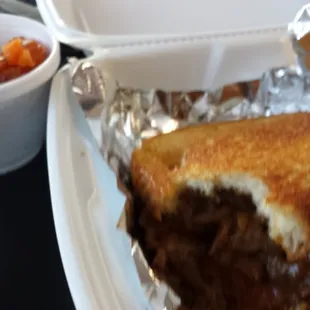 Beef brisket on buttery texas toast and yams. Sorry not the best pic.