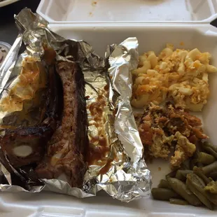 Ribs, Mac and cheese, broccoli cheese casserole, and green beans.