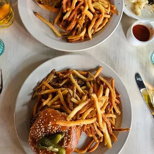 A cheeseburger, with fries, each.