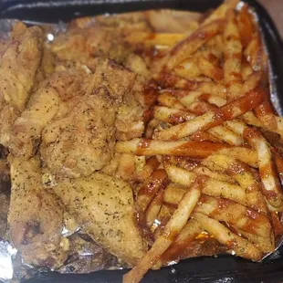 Lemon pepper with fries drizzled with bbq sauce