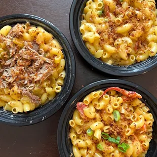 three bowls of macaroni and cheese