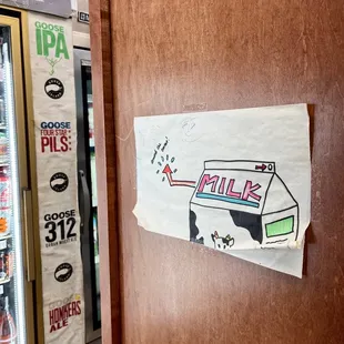 a paper drawing of a box of pills