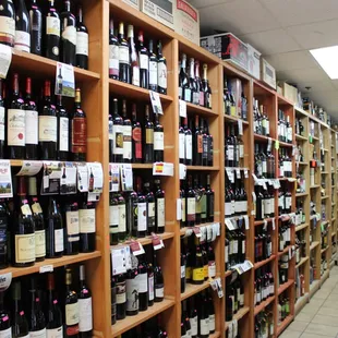 rows of wine bottles on shelves