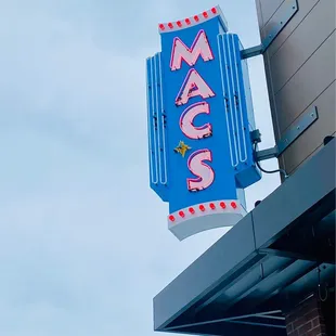 the neon sign for the restaurant