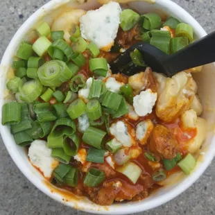Buffalo chicken bits, blu cheese crumbles green onions in thick cheesy noodles. Wonderful!