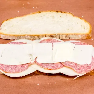 a sandwich with cheese and meat