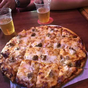 Love it.  Sausage and Pepp.  This stuff is getting better and better.  Heavy cheese all the way to the crust.