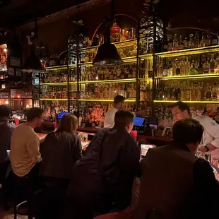 people sitting at a bar