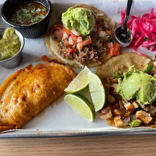 Birria, brisket and chicken brunas tacos. So good.