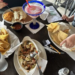 Queso fundido, chicken enchiladas and a kids bean and cheese burrito