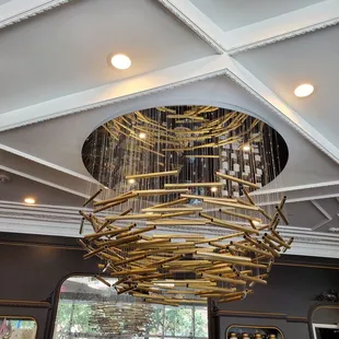 a chandelier made of bamboo sticks