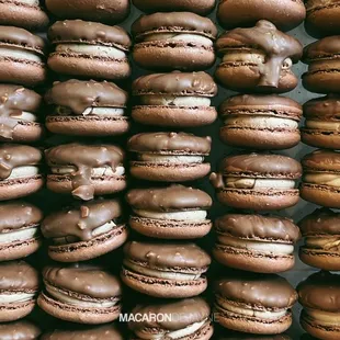 a stack of chocolate macarons